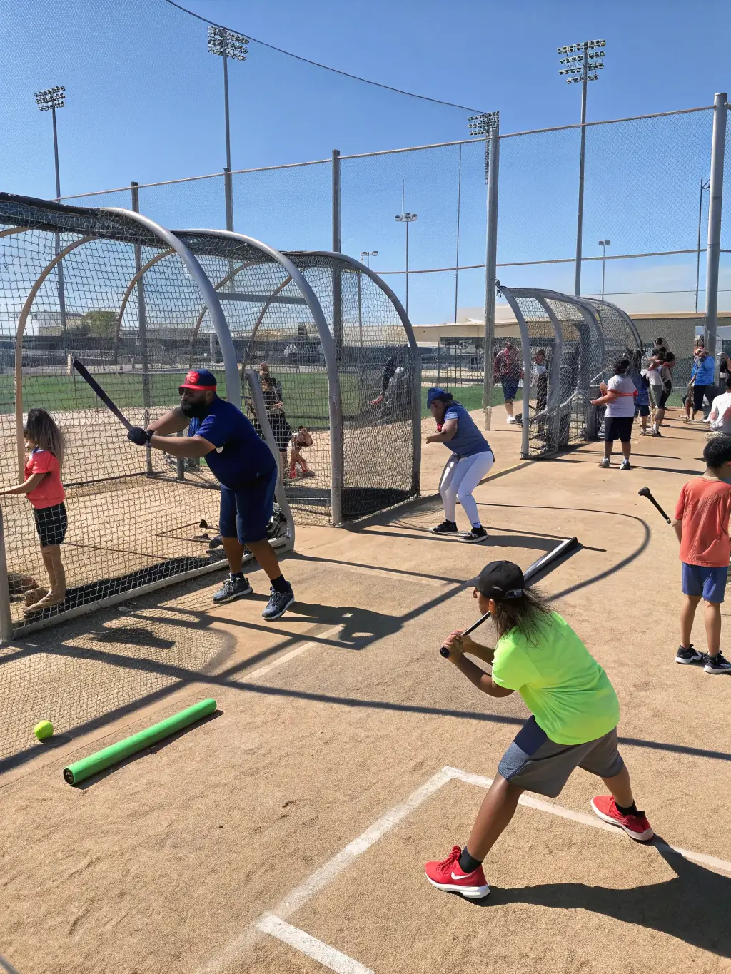 An inclusive image of children participating in a baseball clinic, highlighting the organization's commitment to providing opportunities for children with disabilities.